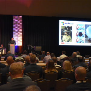 A group of people at a conference